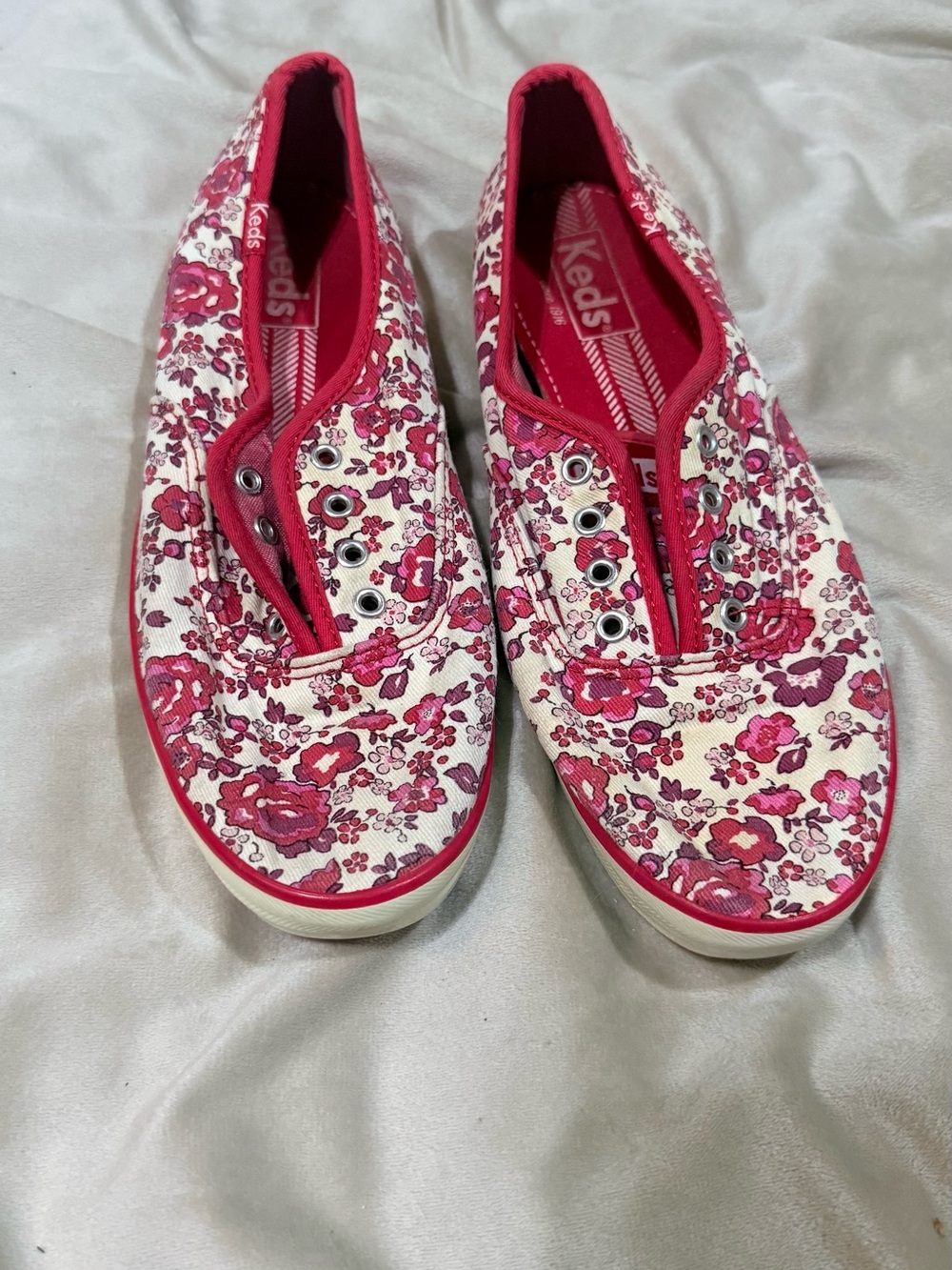 Keds women’s Floral Slip-On Sneakers in Pink and White